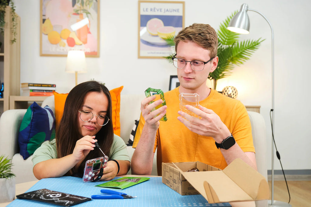 People playing with CircuitMess Chatter 2.0 and Bit 2.0