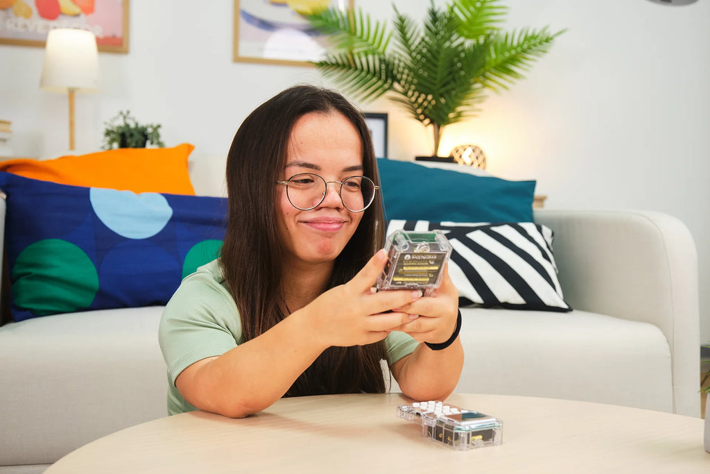 Woman playing with CircuitMess Chatter 2.0
