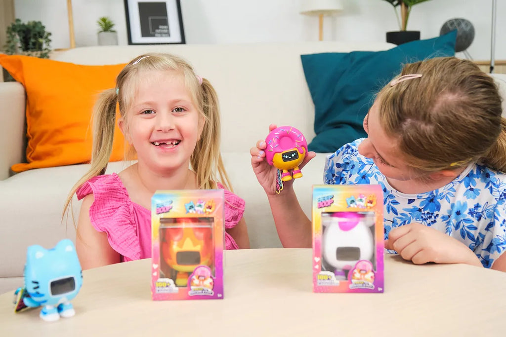 Girls playing with CircuitMess Beep Boops