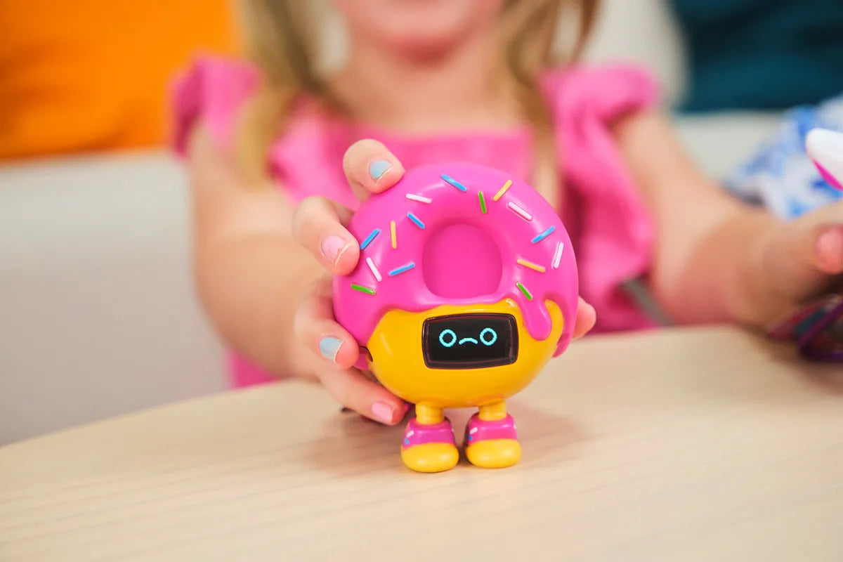 Girls playing with CircuitMess Beep Boop Mochi