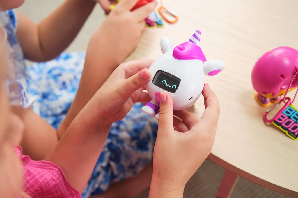 Girls playing with CircuitMess Beep Boop Kirin