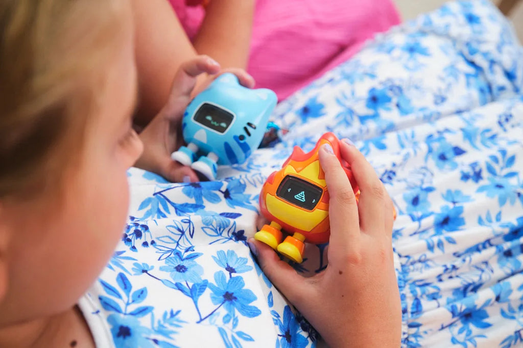 Girls playing with CircuitMess Beep Boop Tochi
