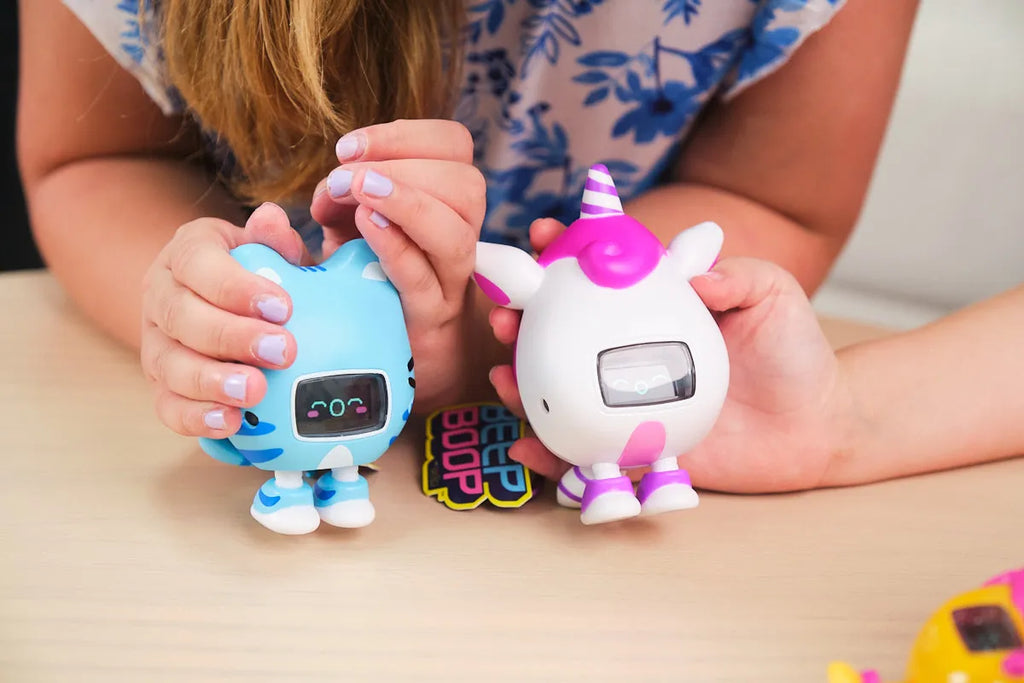 Girls playing with CircuitMess Beep Boop Kirin