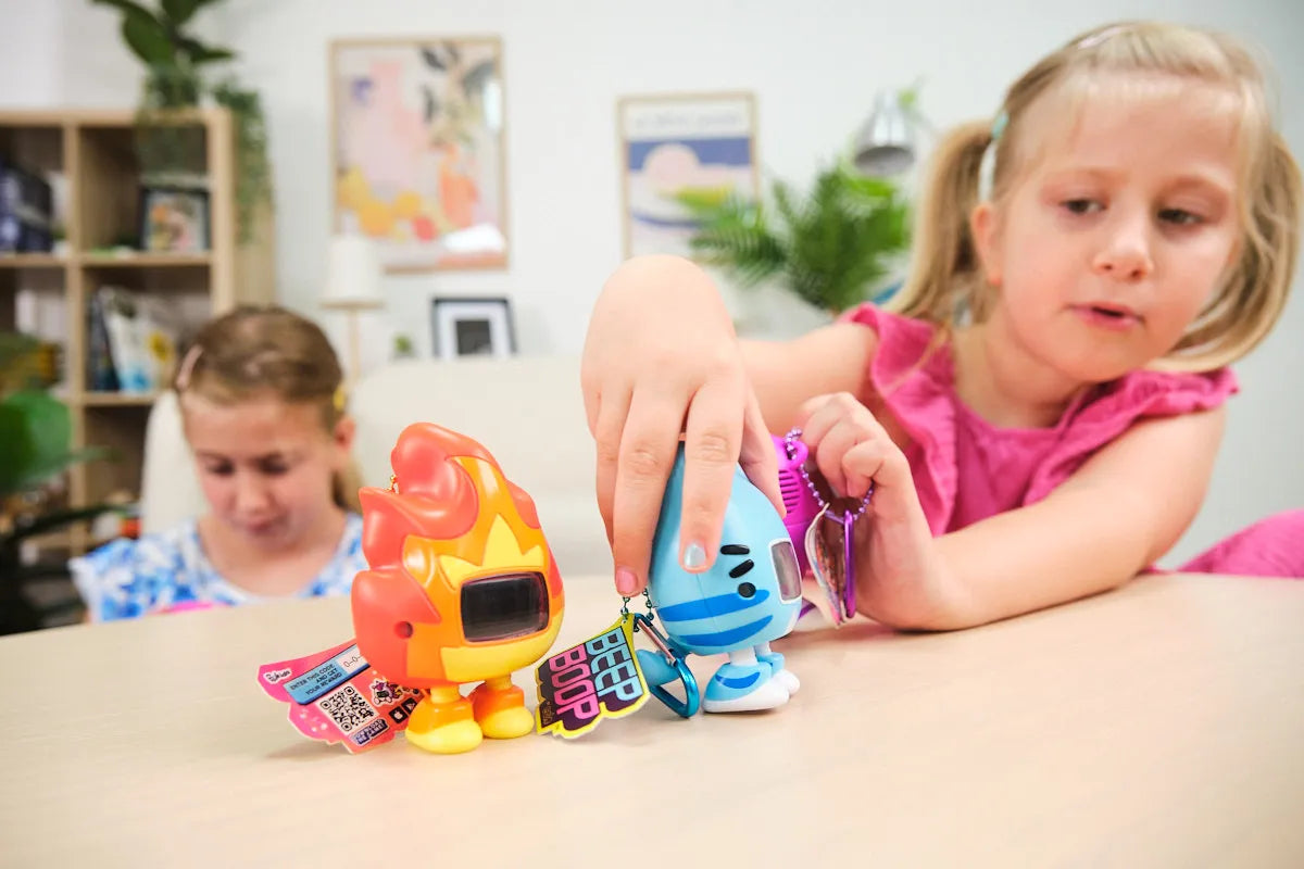 Girls playing with CircuitMess Beep Boop Tochi