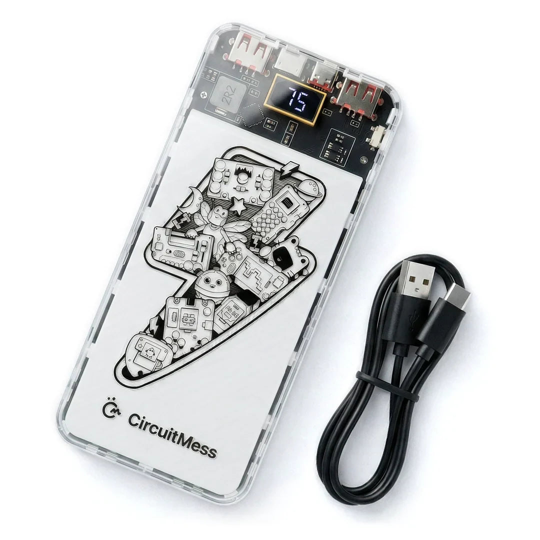 A transparent CircuitMess portable power bank with a black and white graphic illustration on the front, shown next to a black USB-C cable on a white background.